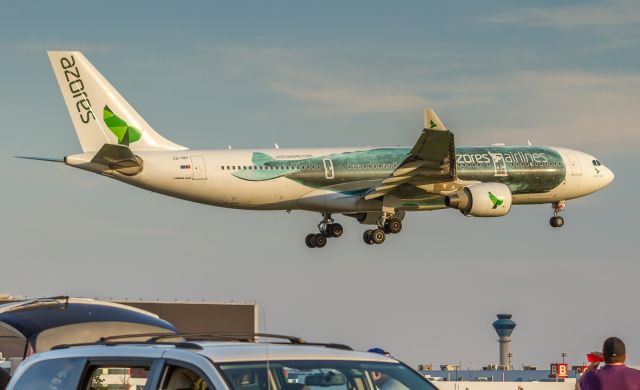 Airbus A330-200 (CS-TRY) - From the top deck of a two story parking structure at YYZ an Azores (SATA Internacional) A332 glides by for touchdown on runway 23.