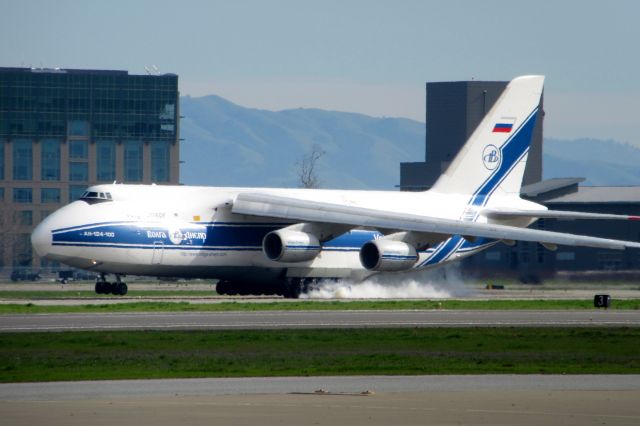 Antonov An-12 (RA-82045) - Touchdown - hard on the left gear.