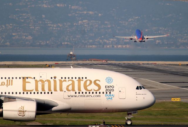 Airbus A380-800 (A6-EOE) - KSFO - Kmart 737 departing 1R as A6-EOE is set to cross 1R and head over to 28R for departure. Click full.