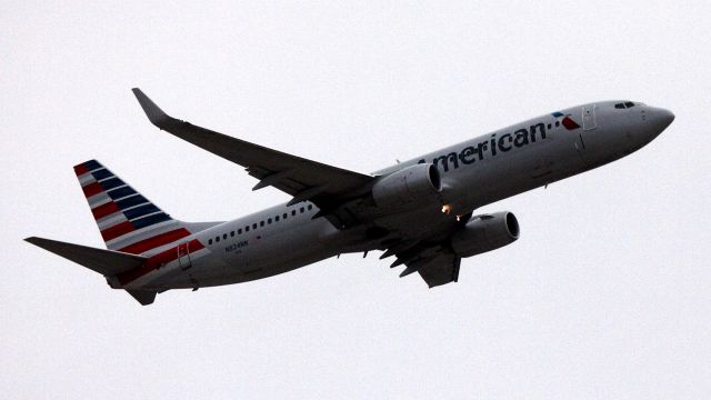 Boeing 737-800 (N824NN) - Departure from 12L, to ORD, Operating as AA #46   08-03-2014  