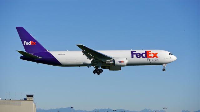 BOEING 767-300 (N109FE) - BOE563 on final to Rwy 16R to complete a flight test on 11/12/14. (ln 1073 / cn 42710).