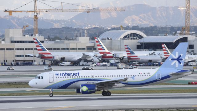 Airbus A320 (XA-JCV) - Taxiing to gate at LAX after landing on 25L