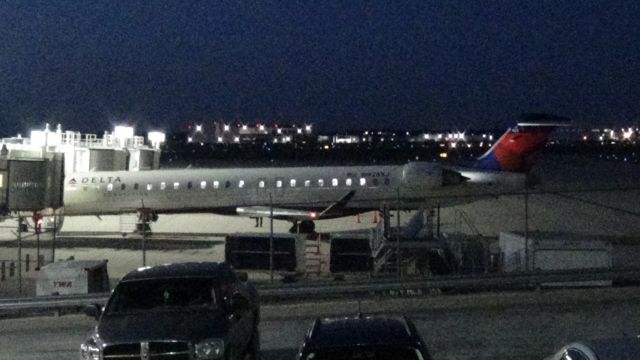 Canadair Regional Jet CRJ-900 (N928XJ) - CRJ-900 at SGF with idling engines. Date - April 25, 2021