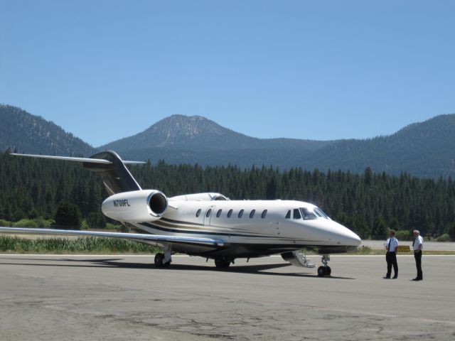 Cessna Citation X (N709FL) - Waiting for the VIP...... Citation X and crew on the ramp at South Lake Tahoe. 8/30/12