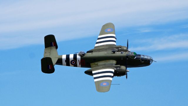 North American TB-25 Mitchell (N88972) - SkyFair 7.21.18: #N88972 North American B-25D Mitchell bomber. (Ser#43-3318) (Mfr 1943) makes a low pass over Rwy 16R.