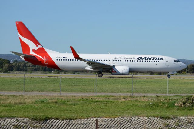 Boeing 737-800 (VH-XZB) - On taxiway heading for take-off on runway 05. Wednesday, 21st May 2014.