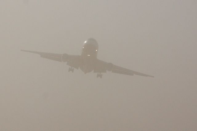 McDonnell Douglas DC-10 (N17085) - Dust storm gusting 36 kts. Tanker 911 coming over the fence.