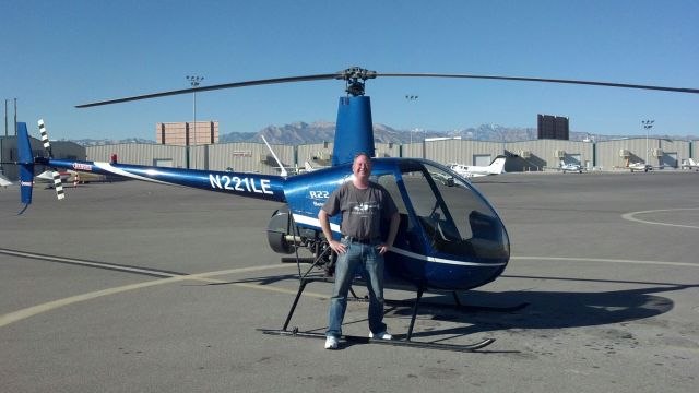 N221LE — - Robinson R-22 Beta II at KVGT 2011-12-26 getting ready for preflight and takeoff.