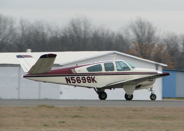 Beechcraft 35 Bonanza (N5698K) - Rolling down runway 14 about to lift off at the Downtown Shreveport airport.