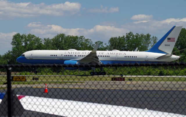 Boeing 757-200 (09-0015) - MORRISTOWN, NEW JERSEY, USA-JUNE 14, 2020: A United States Air Force jet, registration number 90015, is seen as it touches down on runway 5. In a few hours it will become Air Force One as it flies President Donald Trump back to Washington, D.C. after a weekend in New Jersey. When flying into or out of Morristown Airport, the Air Force uses the Boeing 757-200 as Air Force One, instead of the larger 747, because of shorter runways at Morristown.