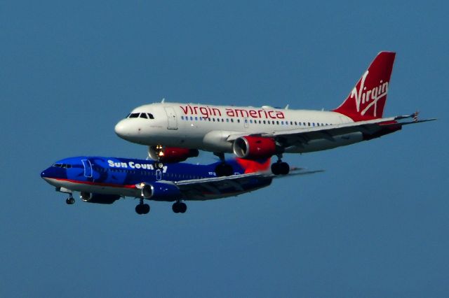 Airbus A320 (N525VA) - Virgin America and Sun Country airlines on tandem approach for 28L and 28R at SFO.