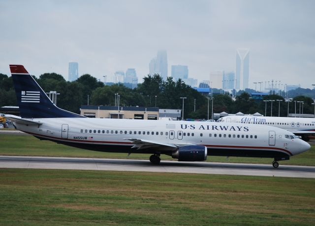 BOEING 737-400 (N455UW) - Rolling 18C - 7/12/10