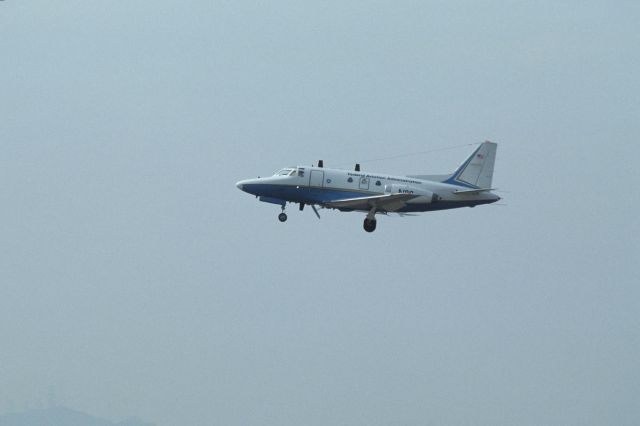 Canadair Challenger (N88) - Short Final at Kai-Tak Intl Airport Rwy13 on 1991/12/14