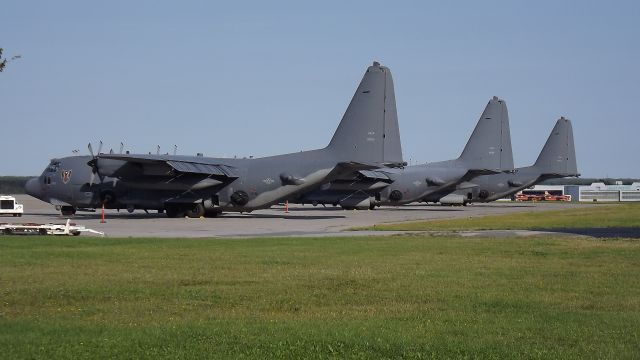 Lockheed C-130 Hercules (N90510) - 3 Lockheed AC-130 Spooky's sit on the ramp at Gander International.