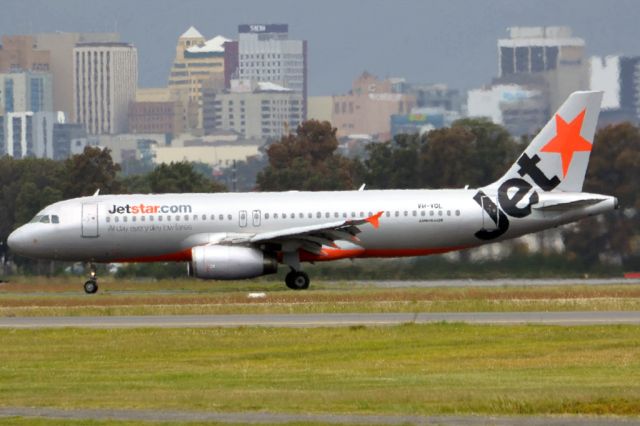 Airbus A320 (VH-VQL) - On taxi-way heading for Terminal 1 after landing on runway 23. Friday 5th October 2012.