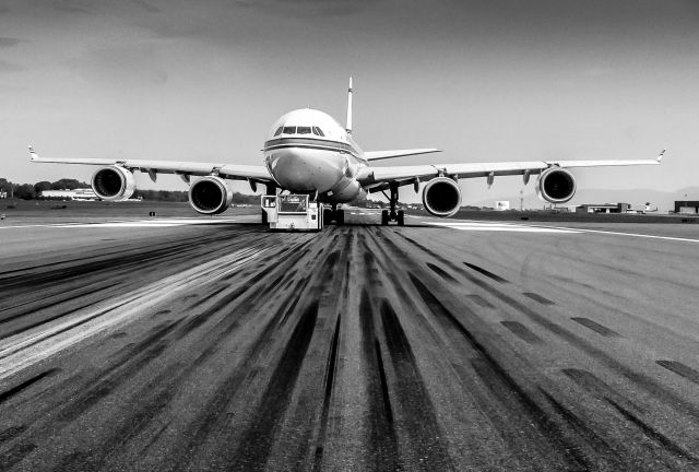 Airbus A340-500 — - Pushed back to the end of the runway due to runway construction.