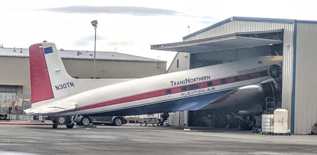 Douglas VC-117 (N30TN) - TransNorthern maintenance hangar, Anchorage International Airport