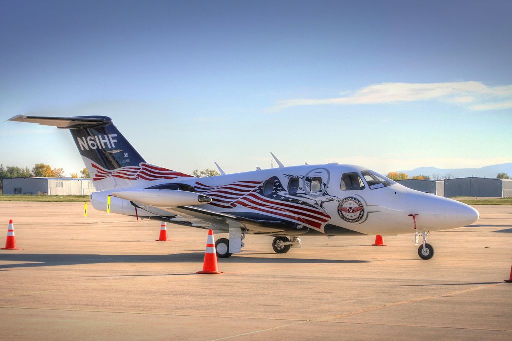 Eclipse 500 (N61HF) - Heroflight Eclipse Jet. You just cant go wrong with that paint scheme. In town along with N800EJ to race a Lexus LFA 10/8/12 (the Lexus won) then off to PSP for the 2012 AOPA Expo.