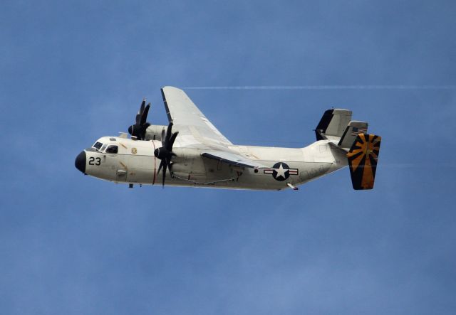 Grumman C-2 Greyhound — - A C-2 banking for a landing on runway 27.