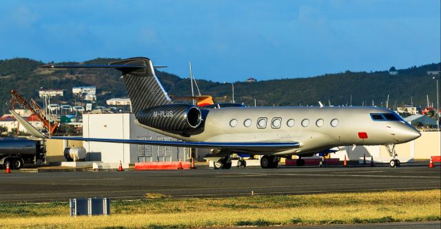 Gulfstream Aerospace Gulfstream G650 (M-PLUS) - GulfStream G650 M-PLUS resting on the general aviation ramp at TNCM St Maarten. just love her shades!! 14/02/2019