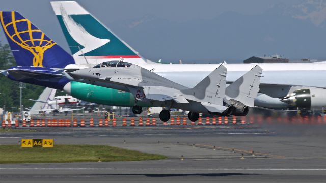 MIKOYAN MiG-33 (N29UB) - MIG-29UB owned by Flying Heritage Collection quickly climbs from runway 34L as it begins a rare flight on 5/9/13. (Ser#50903014896).