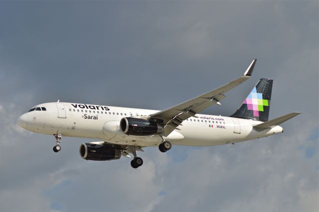 Airbus A320 (N518VL) - Airbus A320-233 N518VL MSN 5488 of Volaris named "Saraí" is on approach to Mexico City International Airport (07/2018).