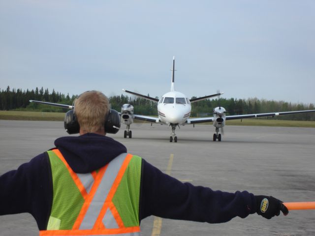 C-GXPS — - Corporate Express Airlines Saab 340A taxiing to a parking spot at the terminal at Fort McMurray, Alberta, Canada