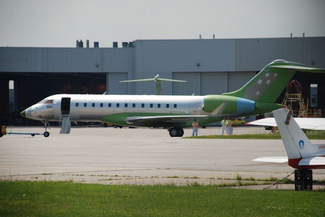 Bombardier Global Express (C-FRKQ) - Bombardier Global Express BD-700-1A10 c/n 9304 parked outside the manufacturing bays at Bombardier Toronto.  Downsview Airport July 17/08.