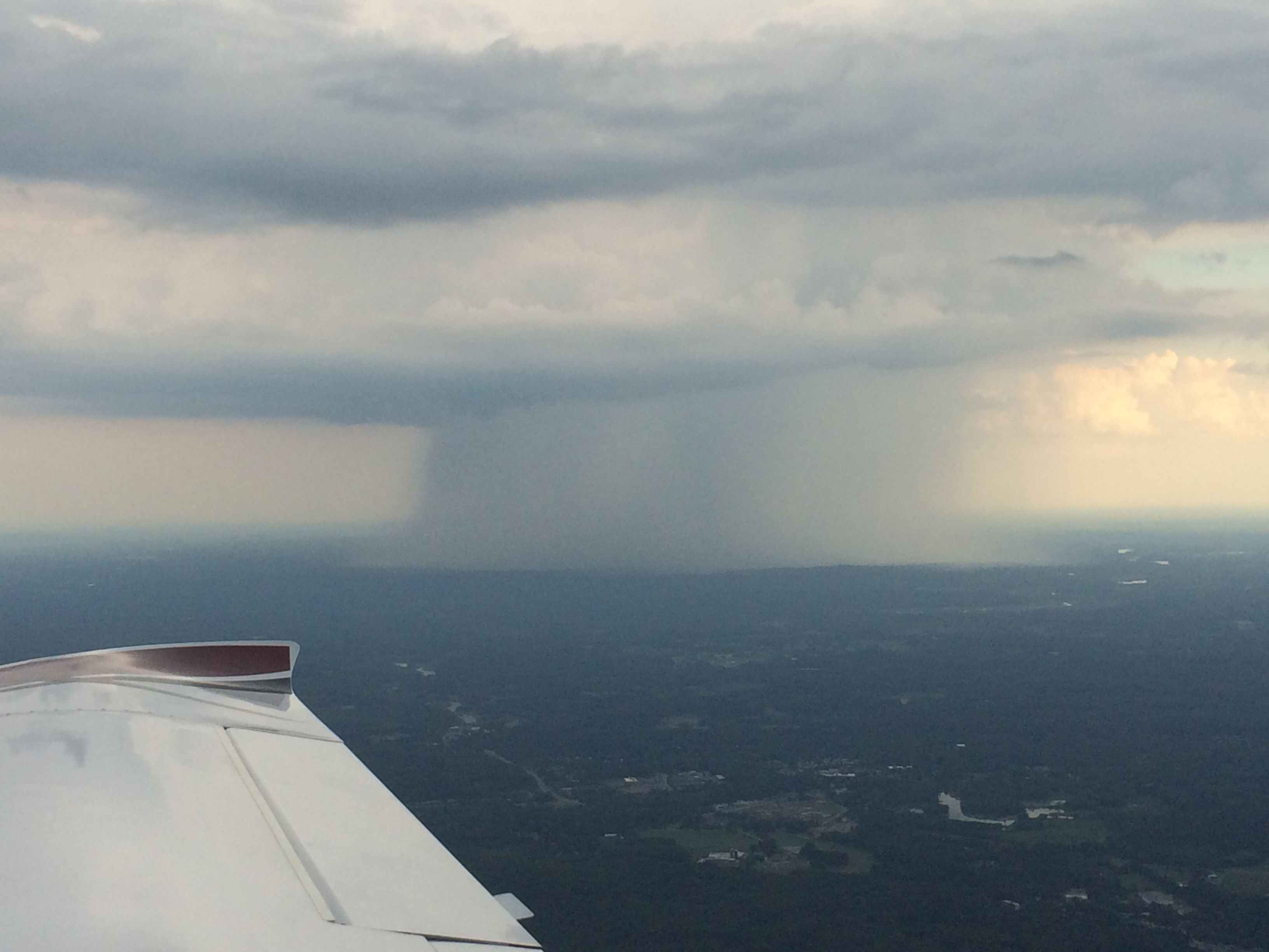 — — - Extreme precip over Boston on final to KLWM