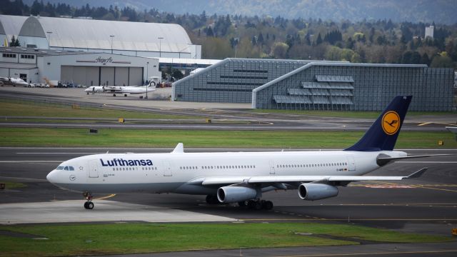 Airbus A340-300 (D-AIFD) - Lufthansa Airbus A340-300 Taxing to runway 28L at Portland International Airport.