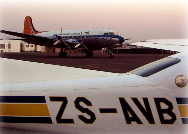 Cessna Centurion (ZS-AVB) - A DC4 at Lanseria.