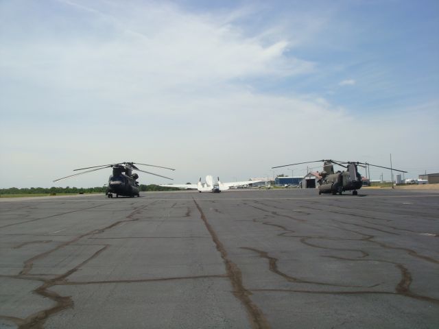 — — - Chinooks with the DC-3 in the back