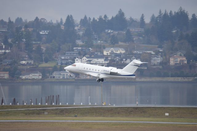 Canadair Challenger (N116JS) - Departing PDX for Kona after lifting off from 28R.