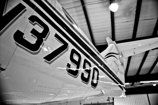 Beechcraft King Air F90 (N37990) - 37990 hides in the hangar at AmericaJet after a bath.