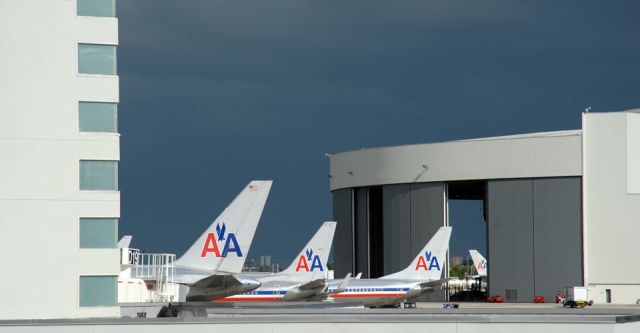 Boeing 737-700 — - Incoming storm at MIA highlights some of the fleet.