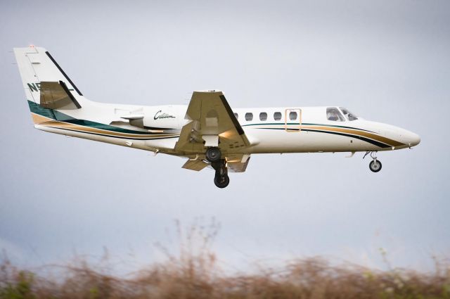 Cessna Citation II (N551CL) - 28.Mar.10  Arriving on 24 as the rain starts to fall.