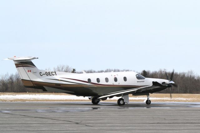 Pilatus PC-12 (C-GECT) - Pilatus taxiing for departure from Kingston Airport (CYGK) on February 28, 2012.