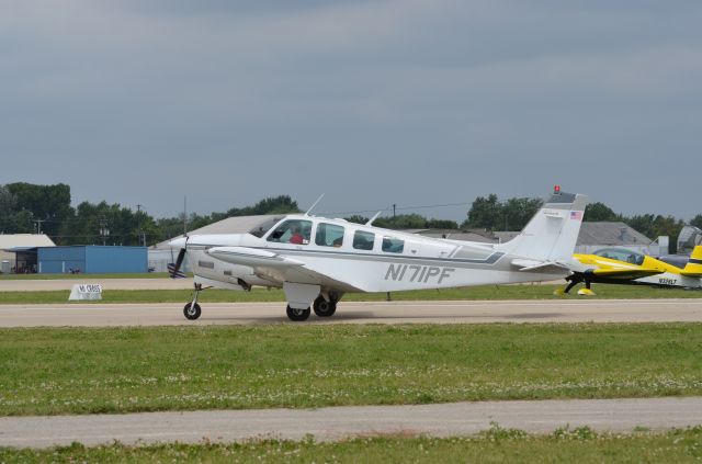 Beechcraft Bonanza (36) Turbo (N171PF) - Bonanza mass arrival at AirVenture 2014