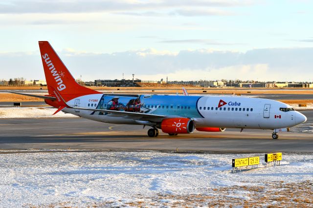 Boeing 737-800 (C-FDBD) - Sunwing Airlines Boeing 737 arriving at YYC from Mazatlan on Dec 21.