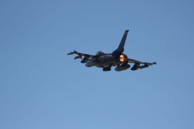 Lockheed F-16 Fighting Falcon — - This F16 from the Colorado National Guard at Buckley AFB was departing runway 14 on its way to bombing practice. It was zipping by me in afterburner at 250+ knots, so I found it difficult to get centered shots.