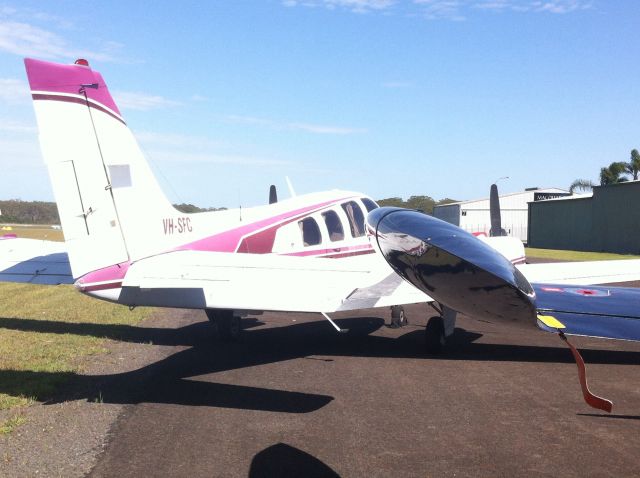 Beechcraft Baron (58) (VH-SFC) - It flew in from Cowra a few days ago, what do you think of the pink?