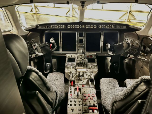 Bombardier Challenger 300 (N883TR) - Cockpit/Flight Deck of N883TR, a 2010 Bombardier Challenger 300, SN 20300, owned/operated privately. 12/13/22. 