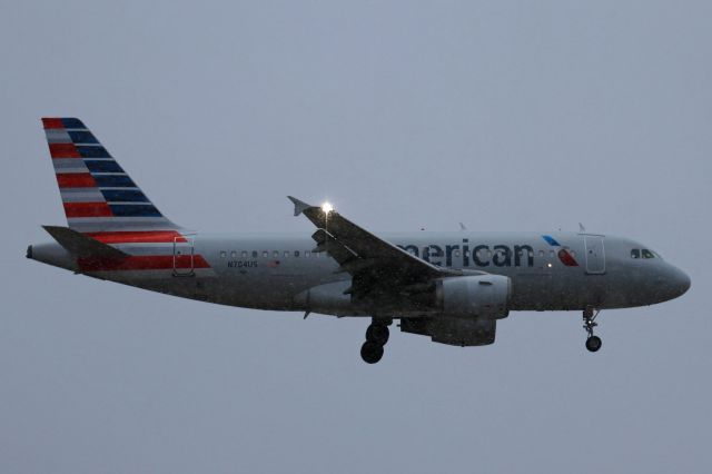 Airbus A319 (N704US) - A former US Airways Airbus on final for RWY 24R from Charlotte/Douglas Intl (KCLT) on a snowy Monday morning, 10 Jan 2021. 