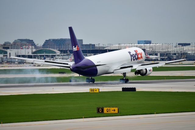 BOEING 767-300 (N269FE) - Touchdown on 10-C 05-06-22