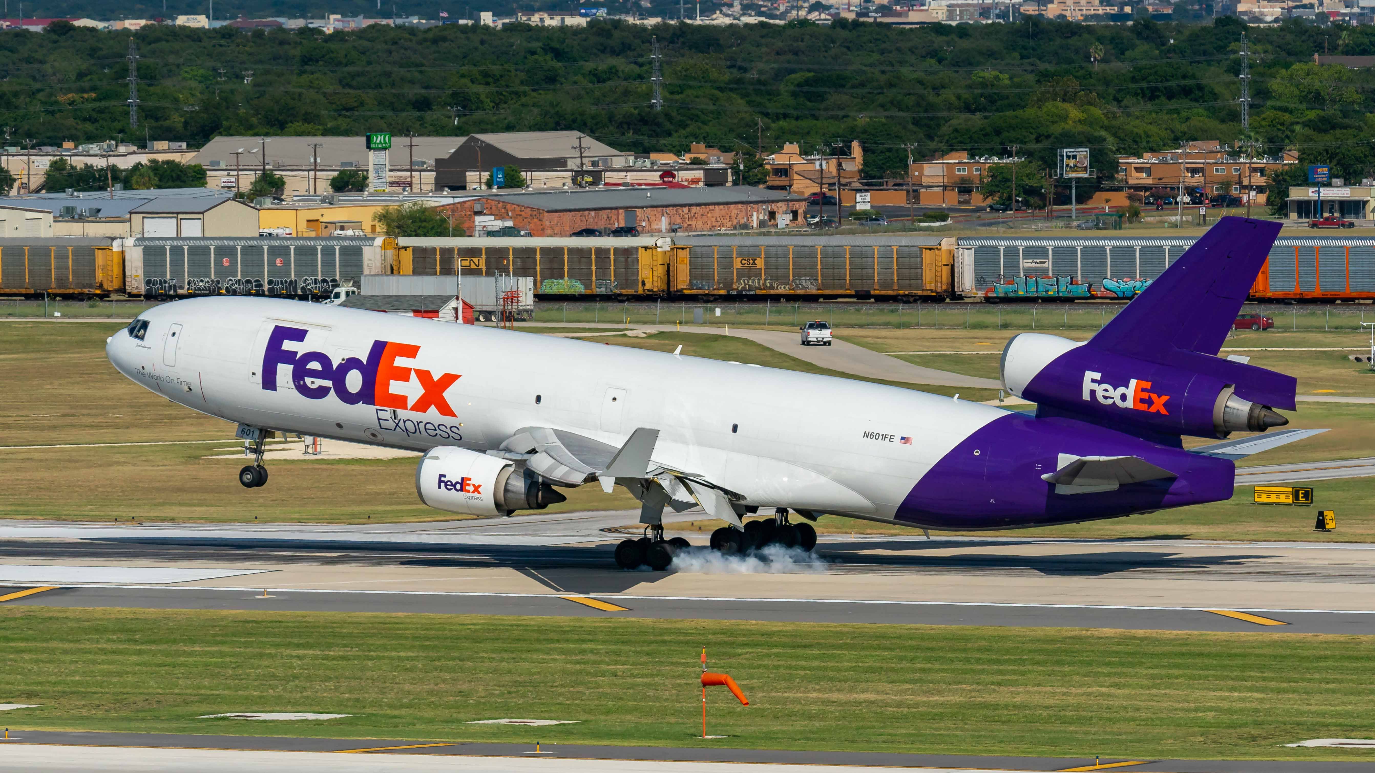 Boeing MD-11 (N601FE) - Touching down on runway 4br /8/1/2018