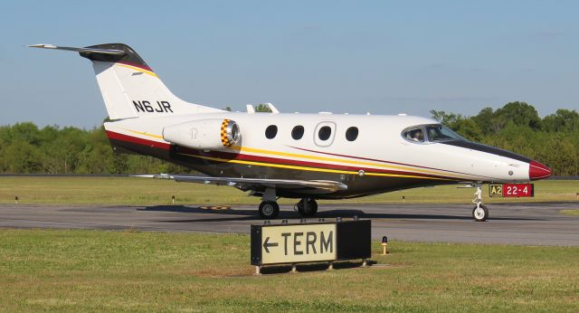 Beechcraft Premier 1 (N6JR) - Roush Fenway Racing's Hawker Beechcraft 390 Premiere 1A taxiing at Boswell Field, Talladega Municipal Airport, AL, after the NASCAR GEICO 500 race at Talladega Super Speedway - late afternoon, April 25, 2021.