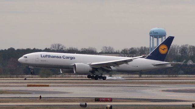 BOEING 777-200LR (D-ALFC) - 2nd landing attempt after a go-around.