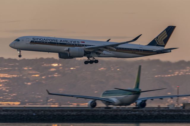 Airbus A350-900 (9V-SGE) - 28th January, 2024: Flight SQ034 from Singapore Changi gliding for touchdown on rwy 28L at SFO as Aer Lingus A330 is holding short.