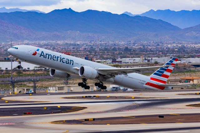 BOEING 777-300ER (N734AR) - An American Airlines 777-300ER taking off from PHX on 2/14/23. Taken with a Canon R7 and Canon EF 100-400 II L lens.