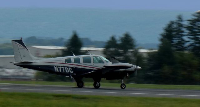 Beechcraft Bonanza (36) (N77DC) - Shortly after touching down is this 1985 Beech A36 Bonanza in the Autumn of 2024.